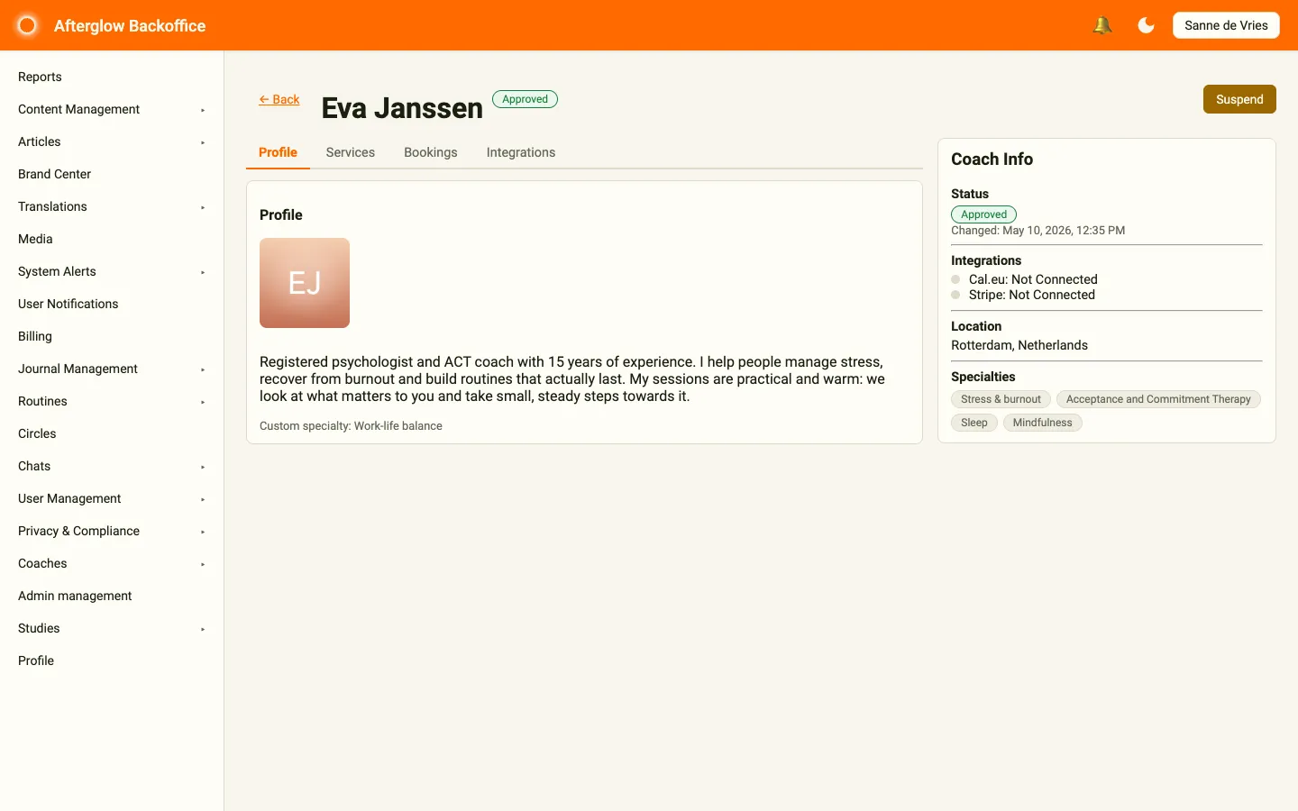 The coach detail page showing the Profile tab with photo, bio and custom specialty, and the Coach Info card with status, integrations, location and specialties.