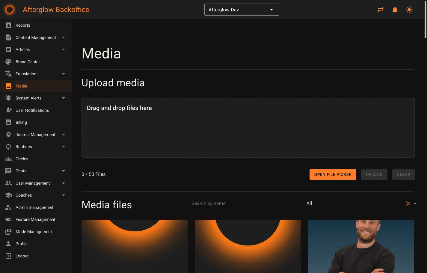 The Media page showing the upload zone and file library grid.